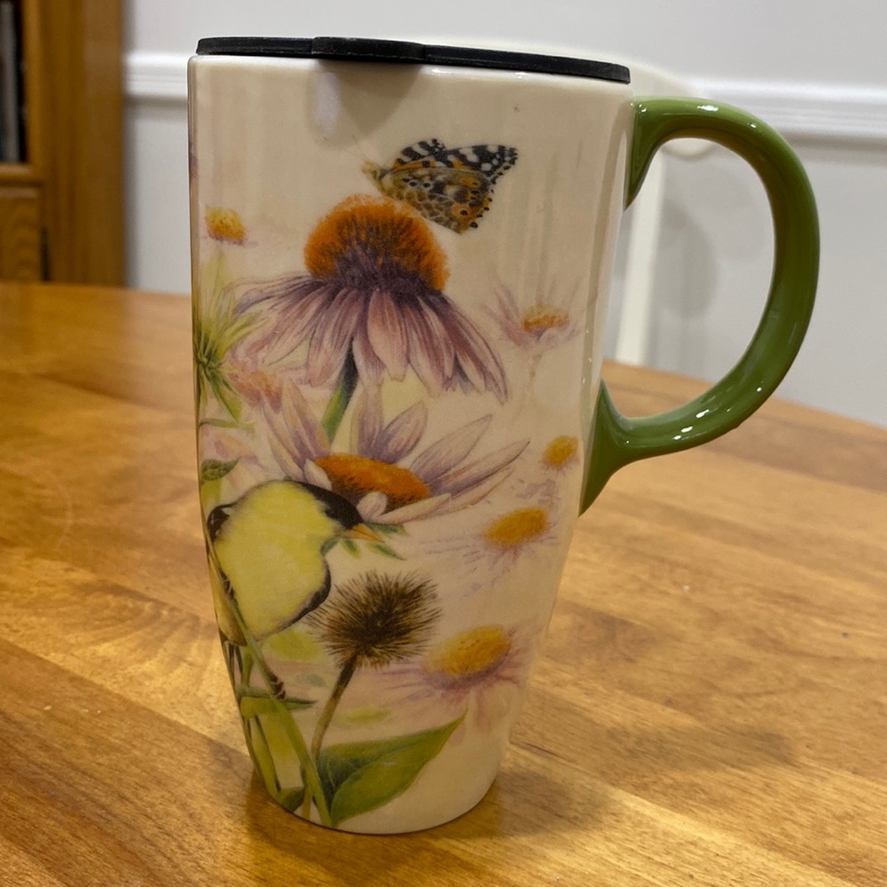 16 oz., ceramic travel mug.